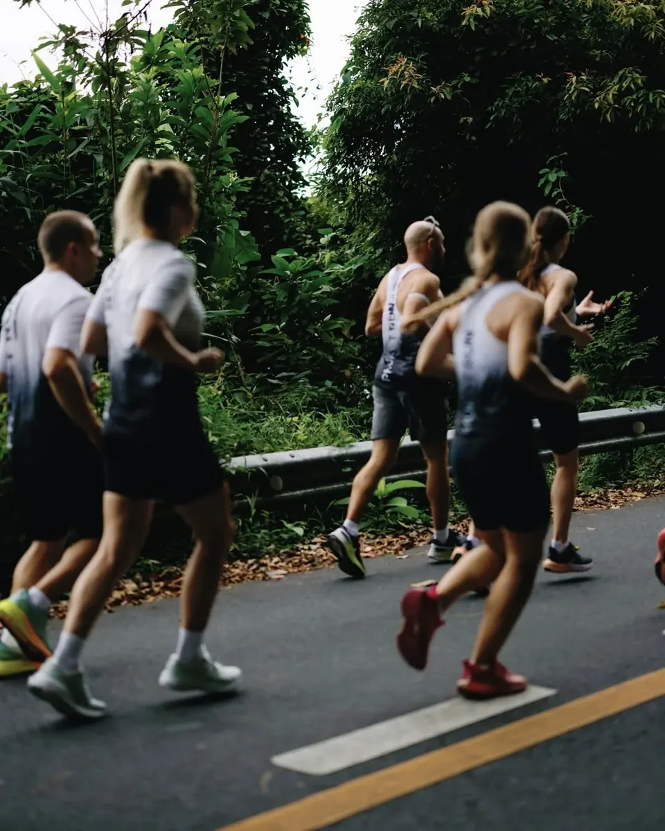 PHUKET RUN participants running alongside trees